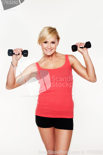 Image of Gorgeous young woman working out