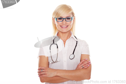 Image of Young blonde attractive doctor with arms crossed