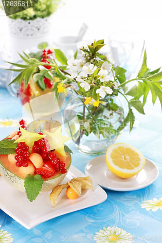 Image of Summer refreshment with dessert fruit and lemonade