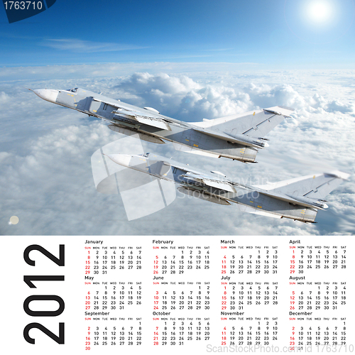 Image of 2012 Calendar with a military plane in the sky and clouds