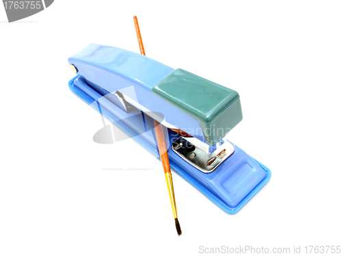 Image of Stapler and brush