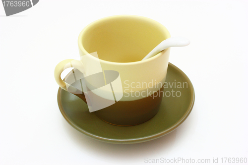 Image of Ceramic cup on a saucer