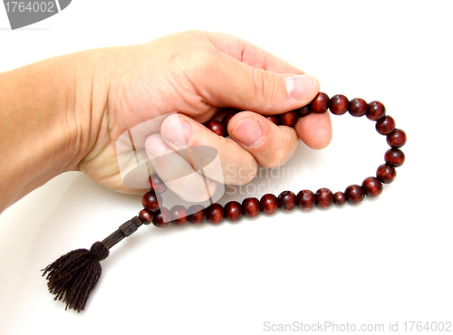 Image of  bead-roll In a hand