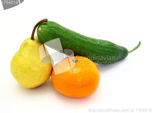 Image of  cucumber with a tangerine and a pear 