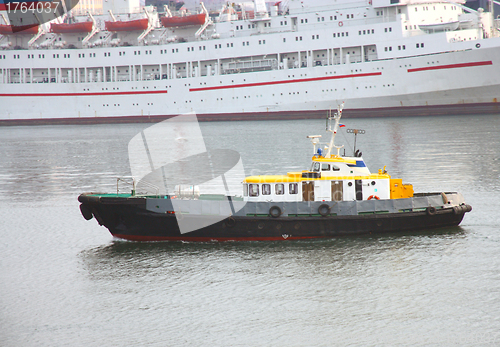 Image of Boat with a yellow roof