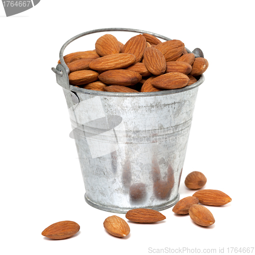 Image of Tin bucket full of almonds