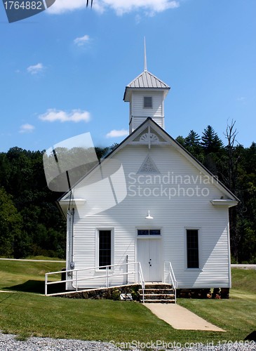 Image of Old fashion white church with steeple