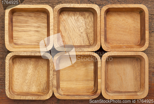 Image of six square wooden bowls