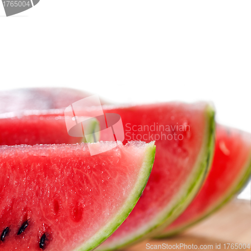 Image of fresh watermelon on a  wood table