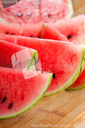 Image of fresh watermelon on a  wood table