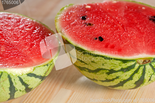 Image of fresh watermelon on a  wood table