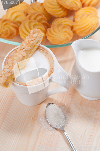 Image of fresh breakfast coffee and pastry