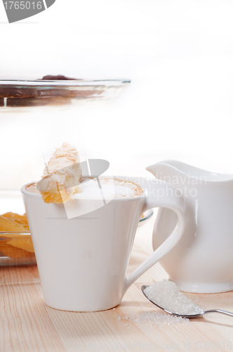 Image of fresh breakfast coffee and pastry