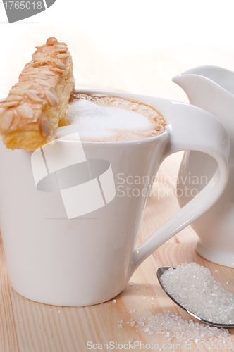 Image of fresh breakfast coffee and pastry