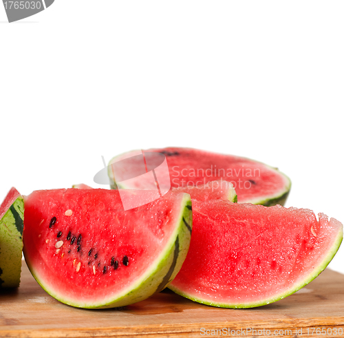 Image of fresh watermelon on a  wood table