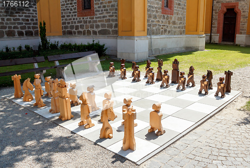 Image of outdoor woden chess