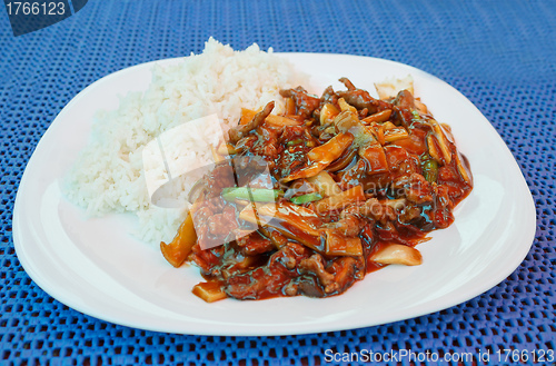 Image of chinesse lunch with fried beef bamboo shoots and rice 
