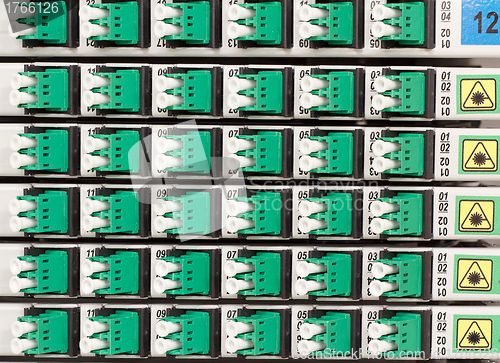 Image of fiber optic rack with high density of optical connectors