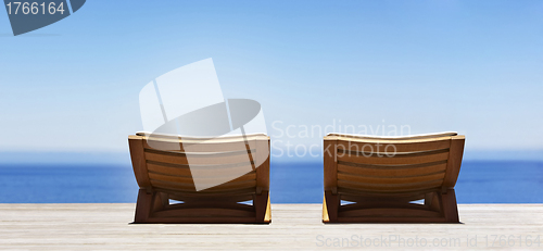 Image of Beautiful beach with chaise lounge