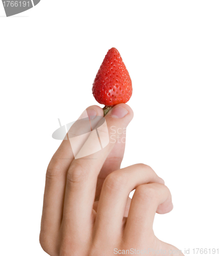 Image of fresh strawberry in hand