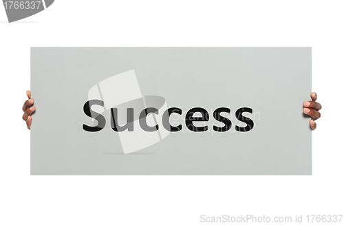 Image of Hand holding a business card isolated