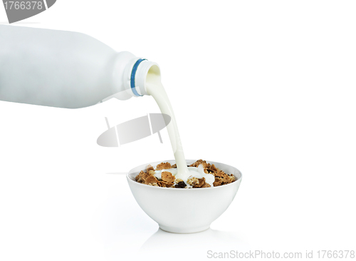 Image of Healthy Breakfast-Cornflakes and Milk Splash.Isolated on white