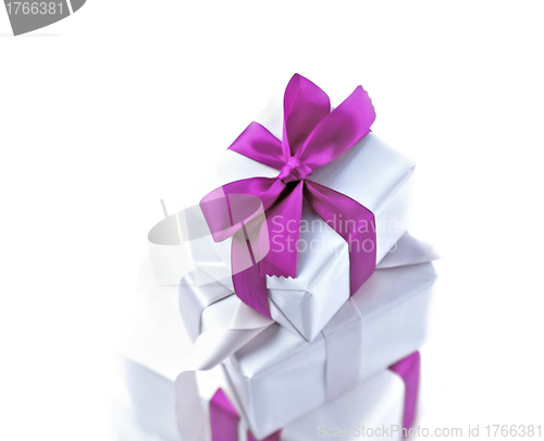 Image of White gift with violet bow