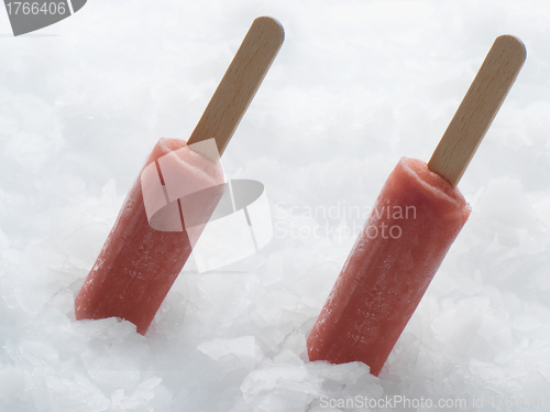 Image of red ice lolly on a white background