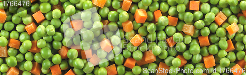 Image of sliced carrots and peas