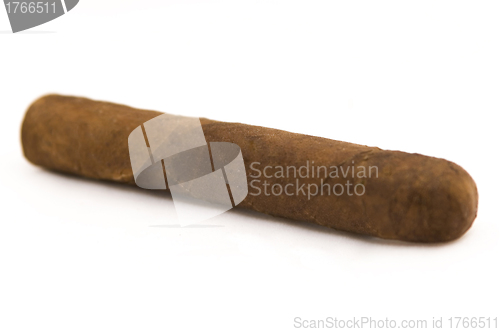 Image of hand rolled cigar isolated on a white background