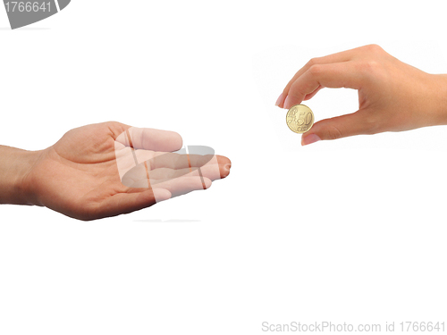 Image of A female hand with coin isolated