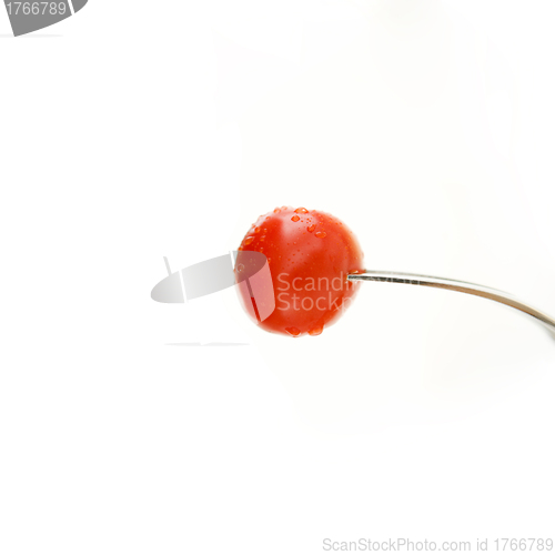 Image of Tomato cherry on a fork