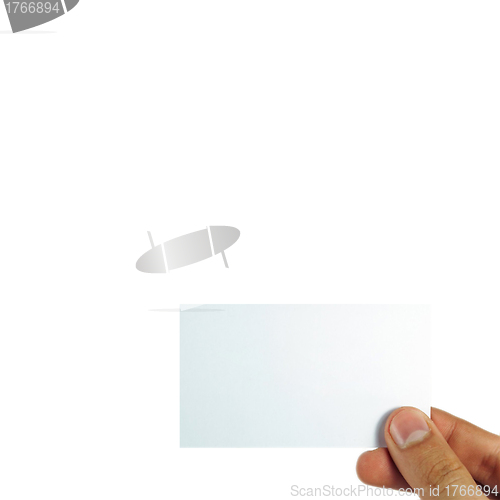 Image of Business card in female hand. Studio isolated