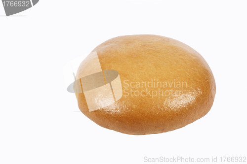 Image of freshly baked kaiser bun on a white background