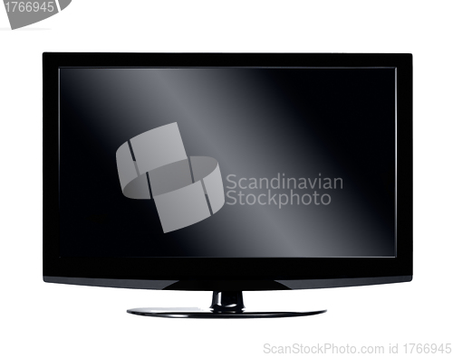 Image of Black LCD tv screen hanging on a wall with shadow