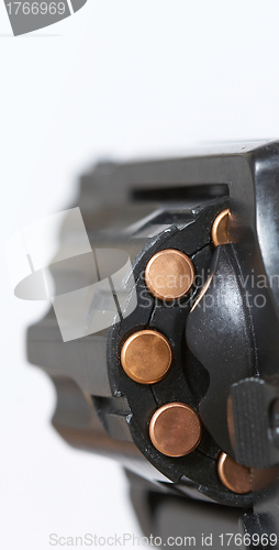 Image of gun with bullets