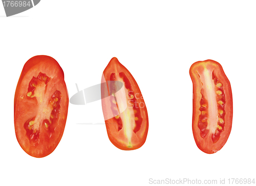 Image of close up of slices of ripen tomato piled on white background