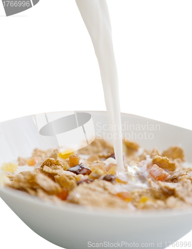 Image of Healthy Breakfast-Cornflakes and Milk Splash