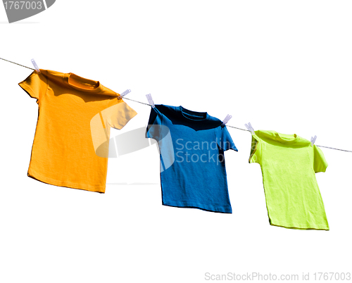 Image of Photograph of four blank t-shirts