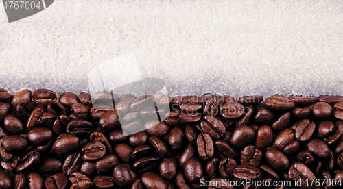 Image of background  coffee beans with lumps of sugar