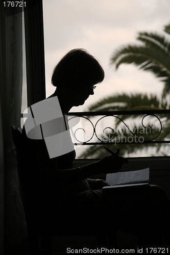 Image of Woman writing diary