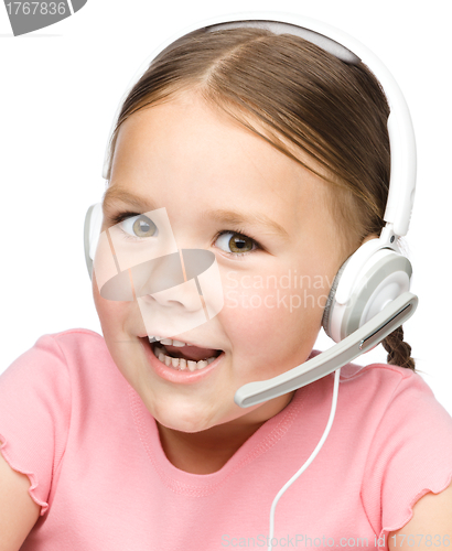 Image of Cute little girl is talking to customers