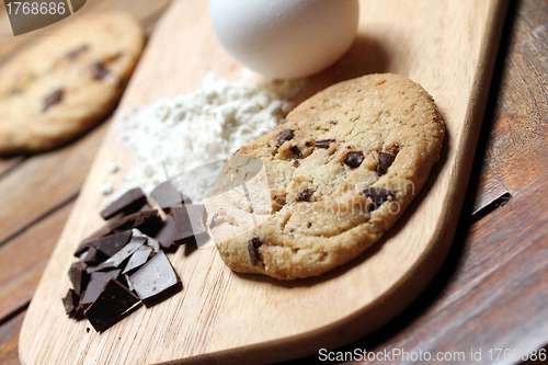 Image of chocolate chip cookie baking