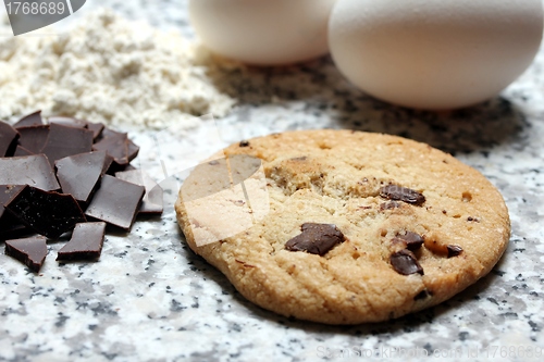 Image of chocolate chip cookie baking