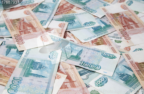 Image of Background of one and five thousand russian roubles bills