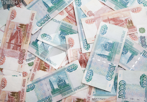 Image of Background of one and five thousand russian roubles bills