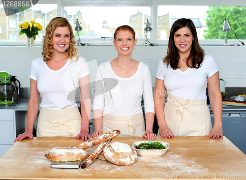 Image of Group of young beautiful professional chefs