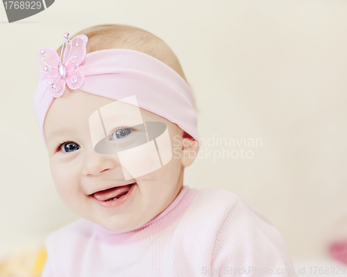 Image of smiling baby girl