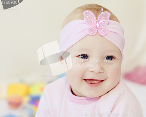 Image of smiling baby girl