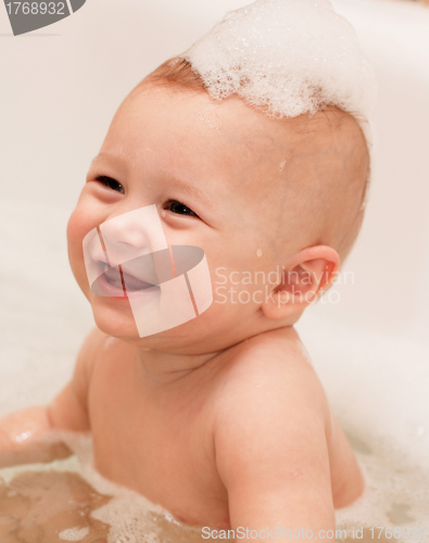 Image of Adorable bath baby with soap suds